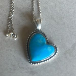 Custom-made sterling silver heart pendant.